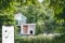The image shows Viessmann Energy Management on a smartphone and a house in the background.